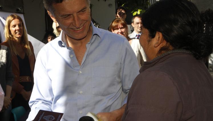 El jefe de Gobierno porteño, Mauricio Macri, encabezó hoy en el Barrio INTA el acto durante el cual se firmaron 180 escrituras. Foto María Inés Ghiglione-gv/GCBA.-